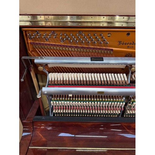 45 - Bösendorfer (c2001)A Model 130 upright piano in a bright mahogany case.