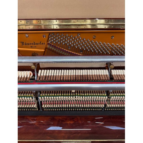 45 - Bösendorfer (c2001)A Model 130 upright piano in a bright mahogany case.