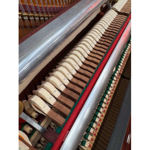 45 - Bösendorfer (c2001)A Model 130 upright piano in a bright mahogany case.