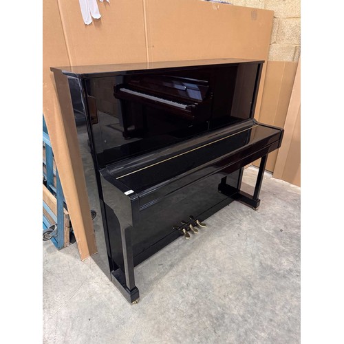 47 - Hoffmann (c2010)A 125cm upright piano in a traditional bright ebonised case; together with a matchin... 