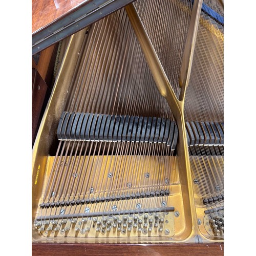 52 - Blüthner (c1976)A 6ft 3in Model 6 grand piano in a bright mahogany case on square tapered legs; toge... 