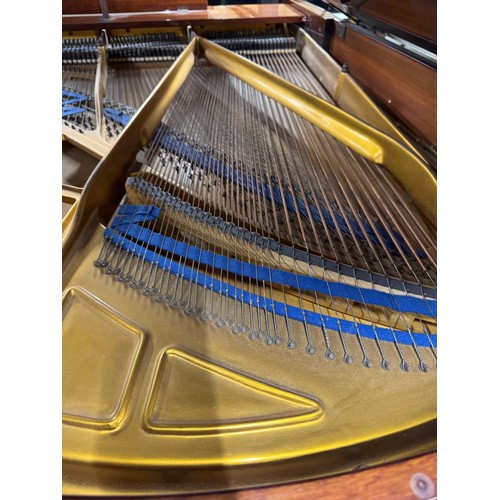 52 - Blüthner (c1976)A 6ft 3in Model 6 grand piano in a bright mahogany case on square tapered legs; toge... 