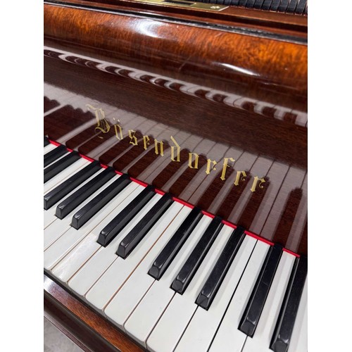 58 - Bösendorfer (c1923)A 5ft 7in Model 170 grand piano in a mahogany case on square tapered legs This in... 