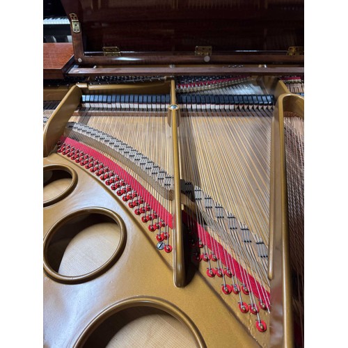 58 - Bösendorfer (c1923)A 5ft 7in Model 170 grand piano in a mahogany case on square tapered legs This in... 