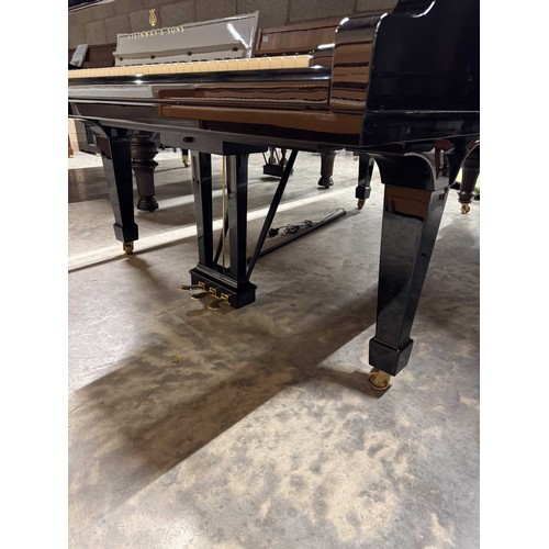 60 - Steinway (c2001)A 6ft 11in Model B grand piano in a bright ebonised case on square tapered legs.... 