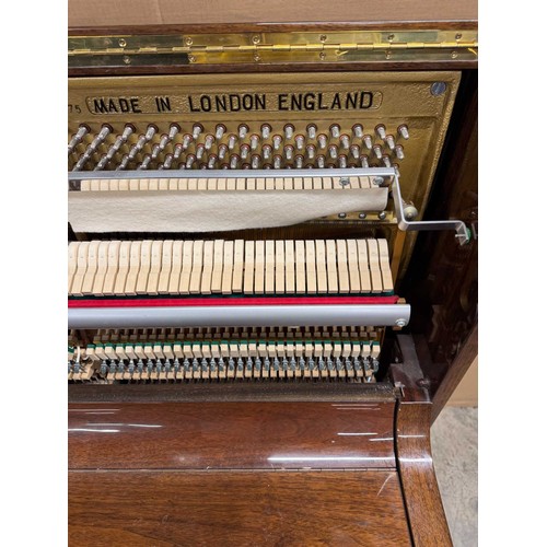 63 - Welmar (c1997)An upright piano in a traditional bright mahogany case; together with a stool.