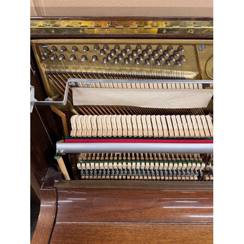 63 - Welmar (c1997)An upright piano in a traditional bright mahogany case; together with a stool.