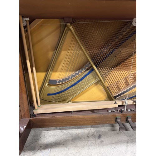 63 - Welmar (c1997)An upright piano in a traditional bright mahogany case; together with a stool.