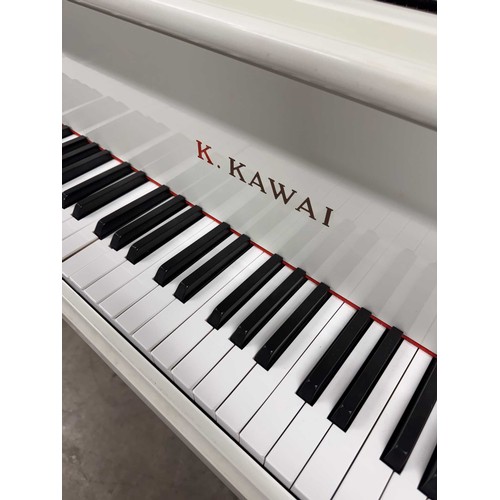 64 - Kawai (c1990)A 5ft 1in Model GE-1 grand piano in a bright white case on square tapered legs; togethe... 