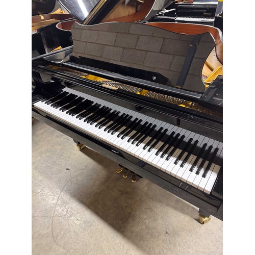 65 - Grotrian Steinweg (c2005)A 6ft 3in Model 192 grand piano in a bright ebonised case on square tapered... 