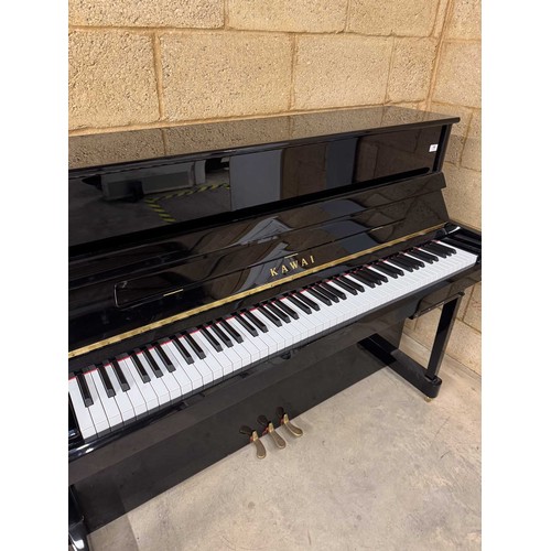 66 - Kawai (c2014)A Model K2-ATX upright piano in a traditional bright ebonised case. This instrument has... 