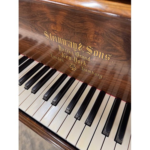 67 - Steinway (c1880)A 6ft 11in Model B grand piano in a rosewood case on turned elephant legs. This inst... 