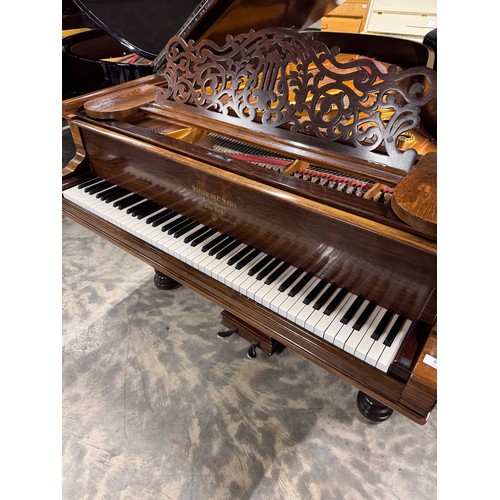 67 - Steinway (c1880)A 6ft 11in Model B grand piano in a rosewood case on turned elephant legs. This inst... 