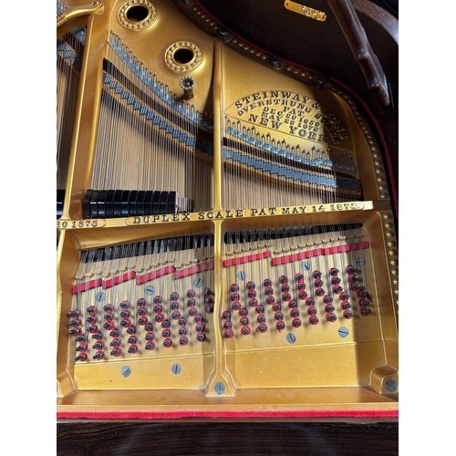 67 - Steinway (c1880)A 6ft 11in Model B grand piano in a rosewood case on turned elephant legs. This inst... 