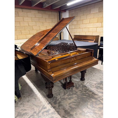 67 - Steinway (c1880)A 6ft 11in Model B grand piano in a rosewood case on turned elephant legs. This inst... 