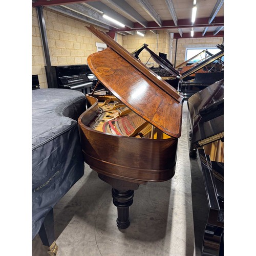 67 - Steinway (c1880)A 6ft 11in Model B grand piano in a rosewood case on turned elephant legs. This inst... 