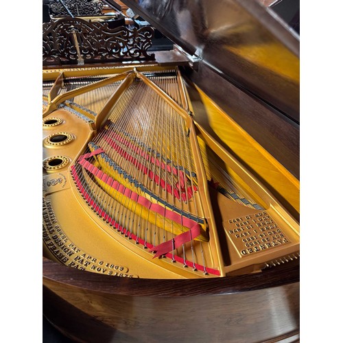 67 - Steinway (c1880)A 6ft 11in Model B grand piano in a rosewood case on turned elephant legs. This inst... 