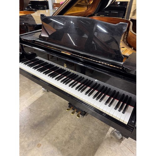 70 - Steinway (c1971)A 6ft 11in Model B grand piano in an ebonised case on square tapered legs.