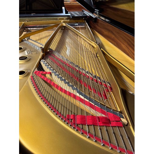 70 - Steinway (c1971)A 6ft 11in Model B grand piano in an ebonised case on square tapered legs.