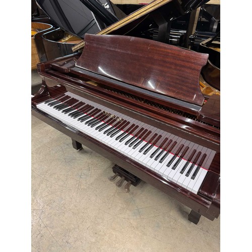 72 - Offenbach by DaewooA recent 4ft 8in grand piano in a bright mahogany case on square tapered legs; to... 