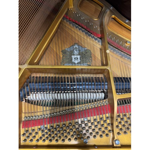 72 - Offenbach by DaewooA recent 4ft 8in grand piano in a bright mahogany case on square tapered legs; to... 