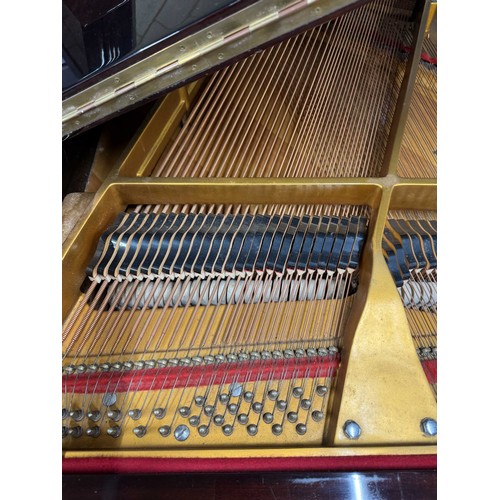 72 - Offenbach by DaewooA recent 4ft 8in grand piano in a bright mahogany case on square tapered legs; to... 