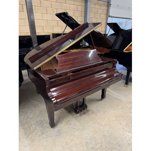 72 - Offenbach by DaewooA recent 4ft 8in grand piano in a bright mahogany case on square tapered legs; to... 