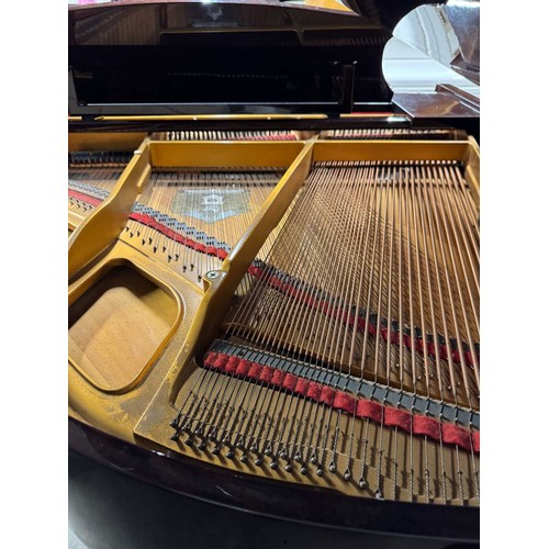 72 - Offenbach by DaewooA recent 4ft 8in grand piano in a bright mahogany case on square tapered legs; to... 