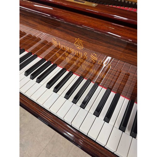 75 - Steinway (c1910)A 5ft 10in Model O grand piano in a rosewood case on square tapered legs. This instr... 