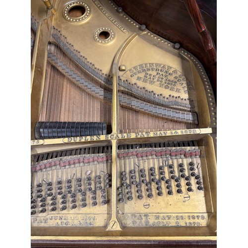 77 - Steinway (c1898)A 5ft 10in Model O grand piano in a rosewood case on turned and reeded legs; togethe... 