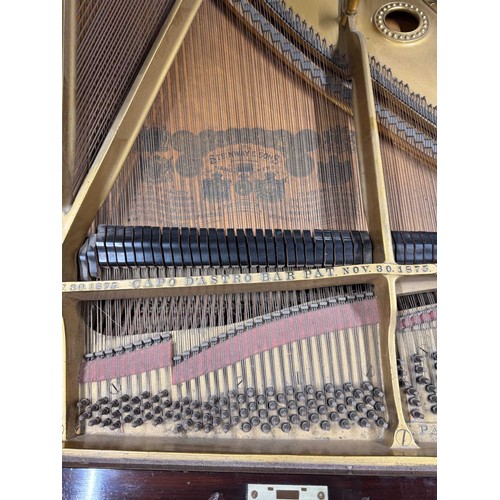 77 - Steinway (c1898)A 5ft 10in Model O grand piano in a rosewood case on turned and reeded legs; togethe... 