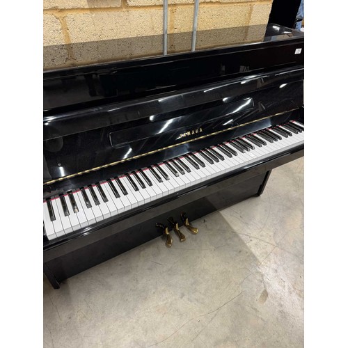 78 - Yamaha (c1973)A Model B1 modern upright piano in a bright ebonised case.