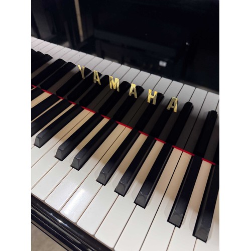 80 - Yamaha (c2008)A 7ft Yamaha Model S6 Hand Built grand piano in a bright ebonised case on square taper... 