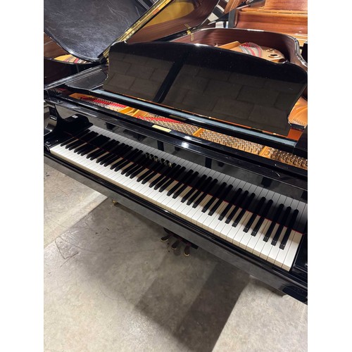 80 - Yamaha (c2008)A 7ft Yamaha Model S6 Hand Built grand piano in a bright ebonised case on square taper... 