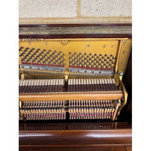 82 - Steinway (c1904)A Model K upright piano in a mahogany case. AMENDMENT Is in a rosewood case. IRN: 17... 