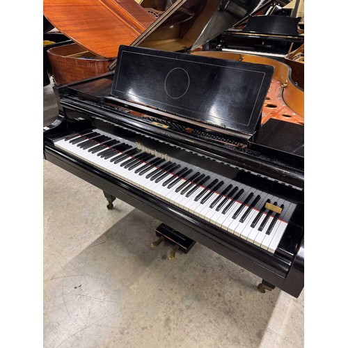 84 - Bösendorfer (c1922)A 5ft 7in Model 170 grand piano in an ebonised case on square tapered legs, this ... 