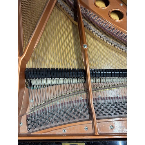 84 - Bösendorfer (c1922)A 5ft 7in Model 170 grand piano in an ebonised case on square tapered legs, this ... 