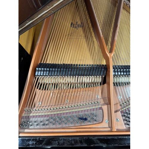 84 - Bösendorfer (c1922)A 5ft 7in Model 170 grand piano in an ebonised case on square tapered legs, this ... 