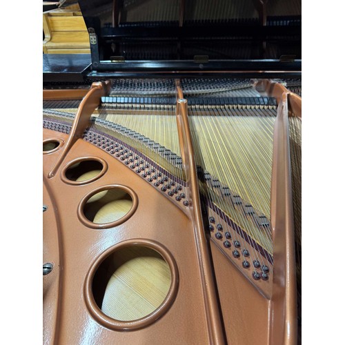 84 - Bösendorfer (c1922)A 5ft 7in Model 170 grand piano in an ebonised case on square tapered legs, this ... 