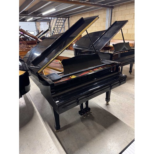 85 - Yamaha (c1989)A 6ft 7in Model C5 grand piano in a bright ebonised case on square tapered legs.