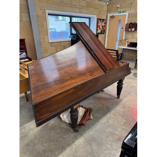 86 - Broadwood (c1824)A 7ft 8in grand piano in a rosewood case supported on turned and fluted legs. AMEND... 