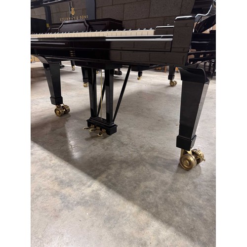 90 - Steinway (c2004)A 9ft Model D concert grand in a bright ebonised case on square tapered legs.