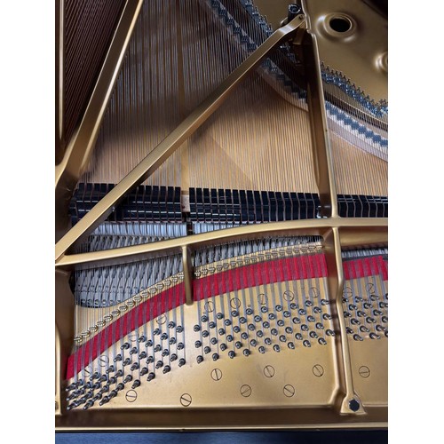 90 - Steinway (c2004)A 9ft Model D concert grand in a bright ebonised case on square tapered legs.