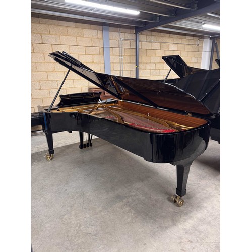 90 - Steinway (c2004)A 9ft Model D concert grand in a bright ebonised case on square tapered legs.