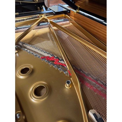 90 - Steinway (c2004)A 9ft Model D concert grand in a bright ebonised case on square tapered legs.