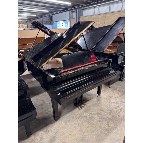 92 - Yamaha (c1975)A 5ft 7in Model G2 grand piano in a bright ebonised case on square tapered legs; toget... 