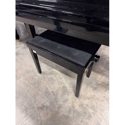 92 - Yamaha (c1975)A 5ft 7in Model G2 grand piano in a bright ebonised case on square tapered legs; toget... 