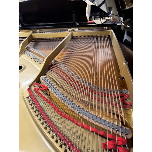 92 - Yamaha (c1975)A 5ft 7in Model G2 grand piano in a bright ebonised case on square tapered legs; toget... 