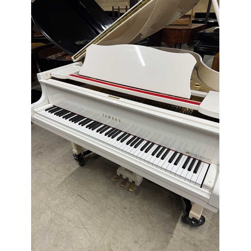 93 - Yamaha (c1988)A 5ft 7in Model G2 grand piano in a bright white case on squarer tapered legs; mounted... 