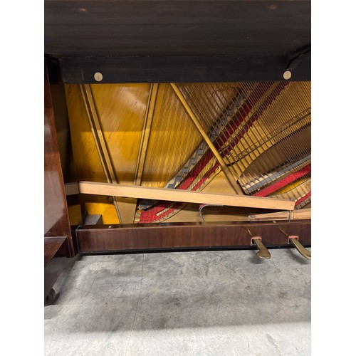 94 - Steinway (c1929)A Model K upright piano in a mahogany case; together with a stool. IRN: JLJP16HS... 